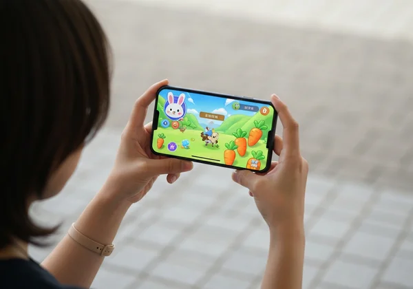 Close-up of hands using phone touch controls